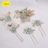 Set of five floral pearl bridal hair accessories featuring light blue flowers and gold accents