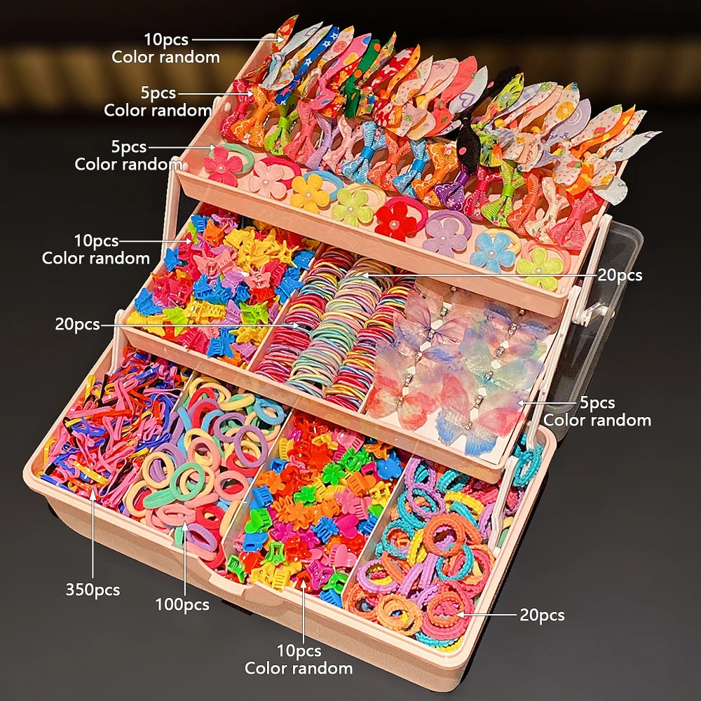 A wooden box filled with various colorful hair accessories and butterfly clips in assorted colors