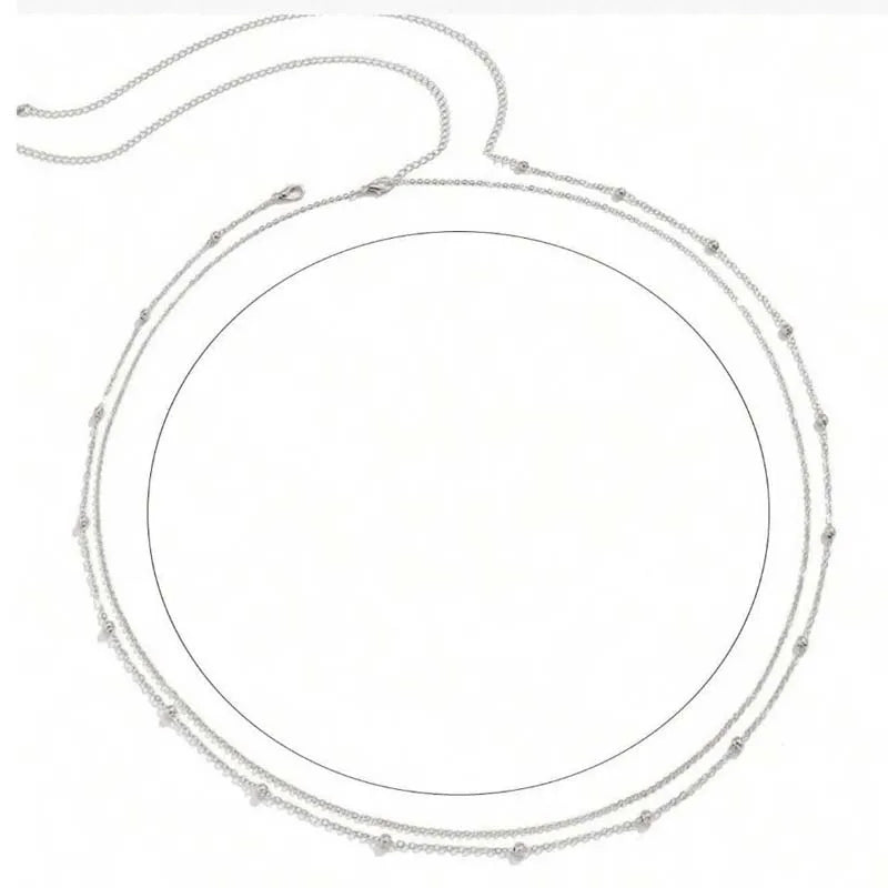 Gold layered metal belly chains for women displayed against a white background.
