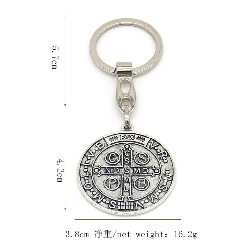 Silver round St. Benedict medallion keychain with a loop and bail