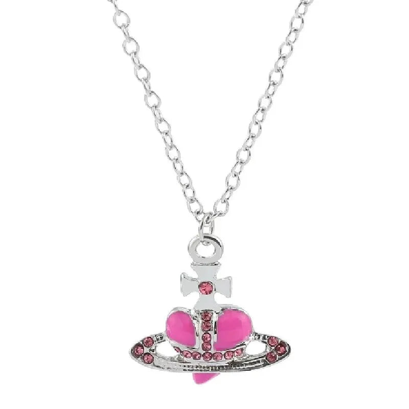 Silberkette mit Vintage-Saturn-Anhänger, rosa Herz und Diamant-Inlay.