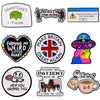 A collection of vintage enamel pins featuring humorous and retro text designs.