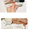 A set of hand-made vintage frosted geometry hair clips in various shades of pink and black displayed on a card.