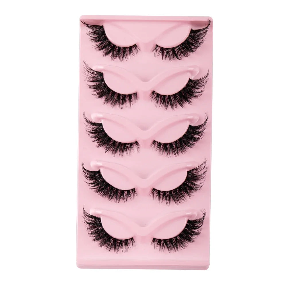 A pink plastic tray holding multiple pairs of premium false cat eye strip eyelashes.