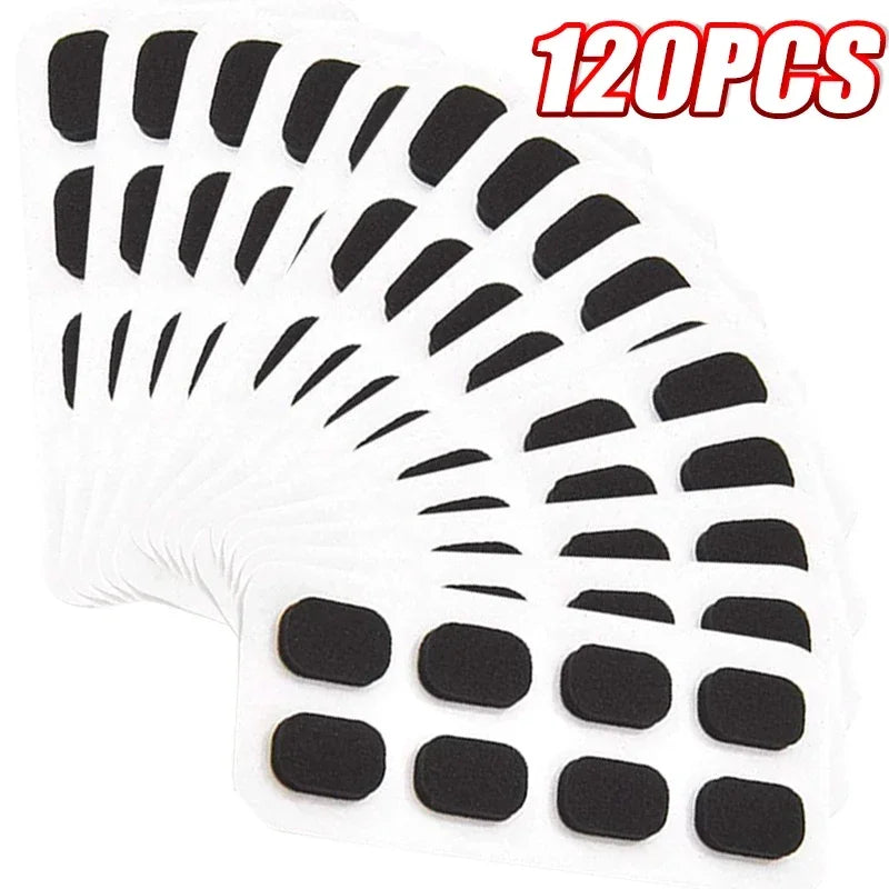 Un paquete de 120 almohadillas nasales para gafas reutilizables antideslizantes en blanco y negro.