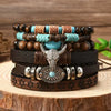 A stack of handcrafted retro western beaded bracelets featuring brown leather, silver metal, and turquoise beads.