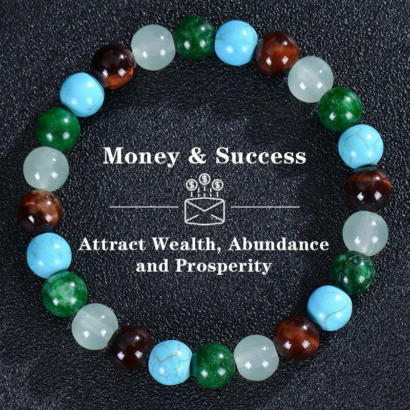 A bracelet made of various colored crystals, including green, blue, and brown, arranged in a circle.