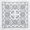 Black line art pattern of ornate floral and scroll designs on a white background