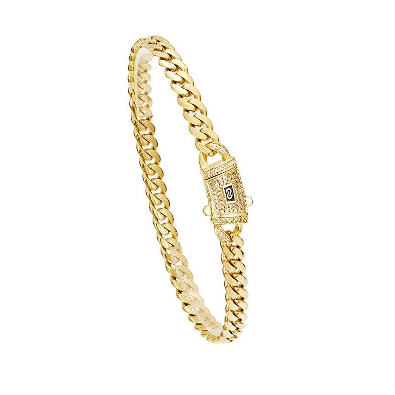 A gold Cuban link chain necklace with a square pendant and a bail.
