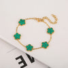 Pulsera de acero inoxidable chapada en oro con imanes florales de planta verde y dorada
