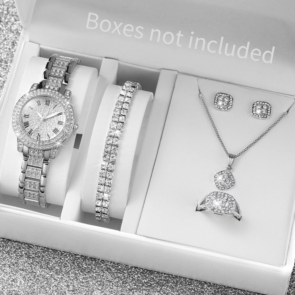 A white box displays a quartz watch set including a wristwatch, a bracelet, and a necklace.