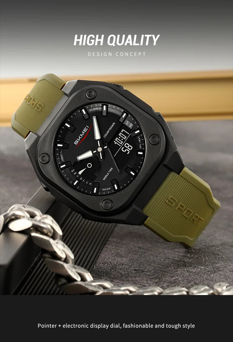 A black sports watch with a olive green strap and a silver chain displayed on a dark surface.