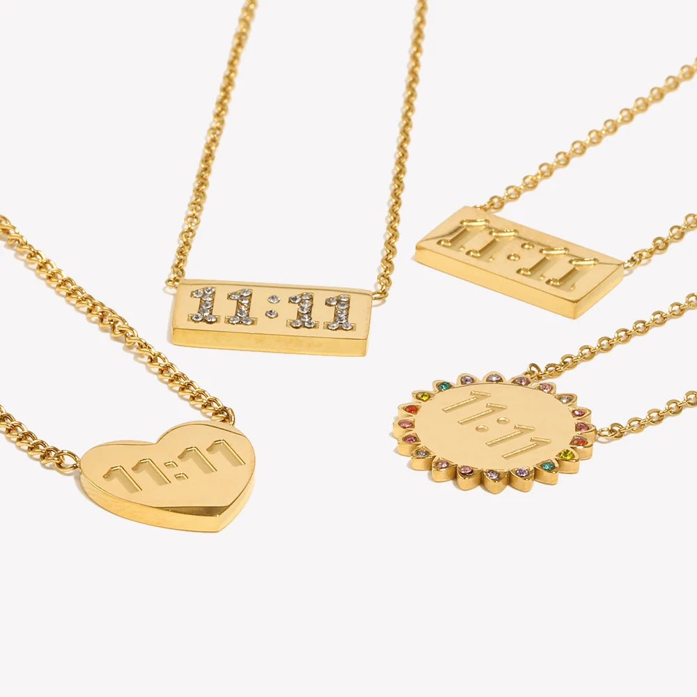 A set of gold-plated rectangle and heart pendant necklaces featuring the '11:11' design.