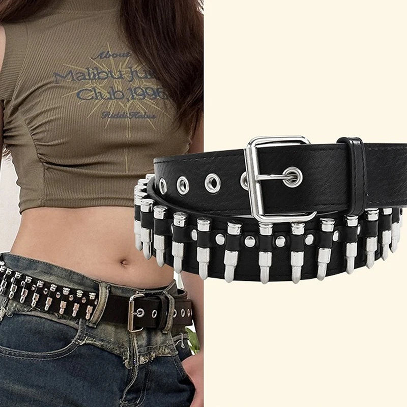 Black leather goth punk belt with silver buckle and bullet studs worn around the waist.