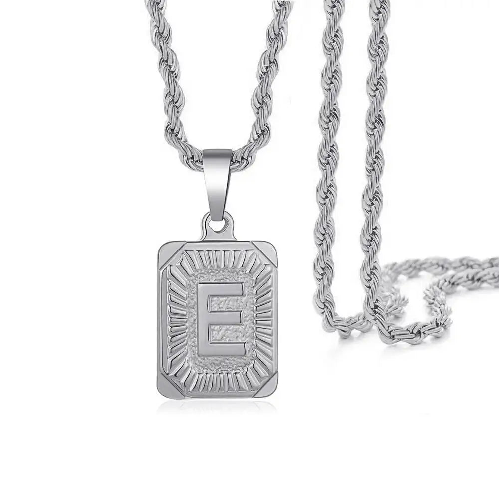 A silver letter E pendant necklace with a chain, displayed against a white background.