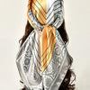 Elegant floral satin shawl tied around a dark brown hairstyle, featuring gold and silver stripes.