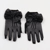 Pair of black mesh finger gloves with large satin bows