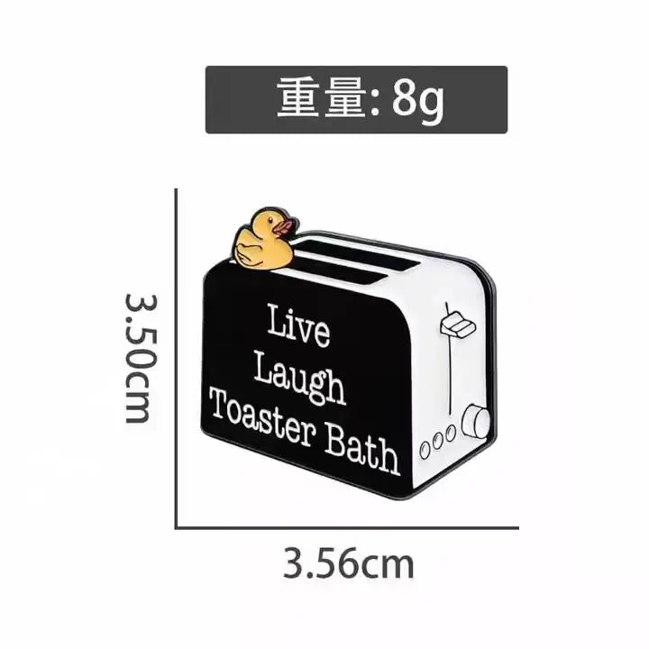 A black toaster bath shaped like a duck is shown with a small yellow duck on top.