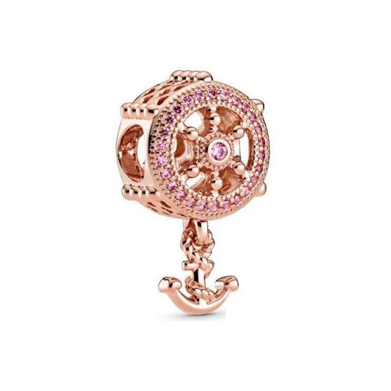 Rose gold cherry blossom charm pendant with a detailed floral design.