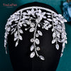 A sparkling rhinestone bridal hair hoop displayed on a black mannequin.