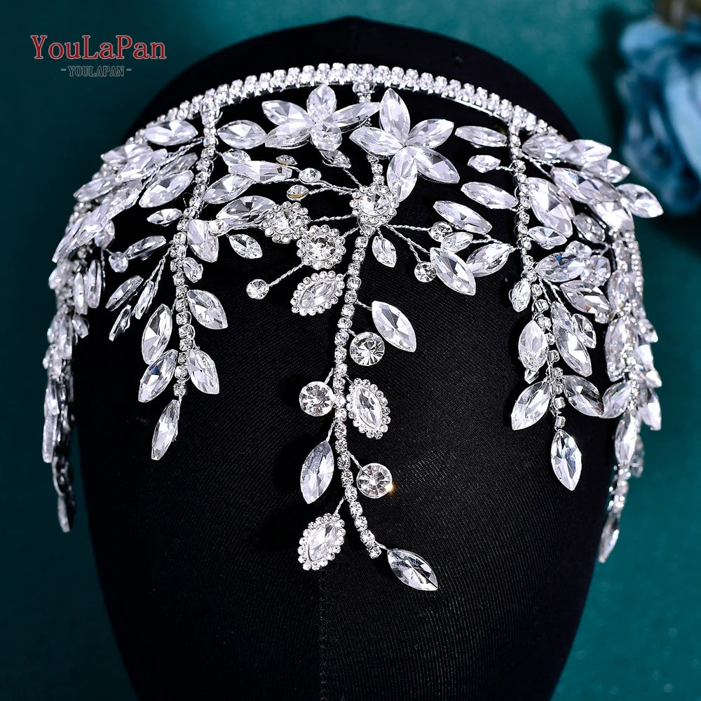 A sparkling rhinestone bridal hair hoop displayed on a black mannequin.