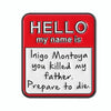 A red enamel lapel pin with the text HELLO my name is Inigo Montoya you killed my father Prepare to die.
