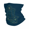 A dark teal bandana neck gaiter featuring an ornate golden hamsa hand design.