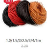 A bundle of various colored stainless steel ball pins in red, black, and orange, showing different gauges.