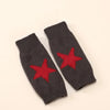 A pair of dark gray knitted half finger gloves featuring a red star pattern.