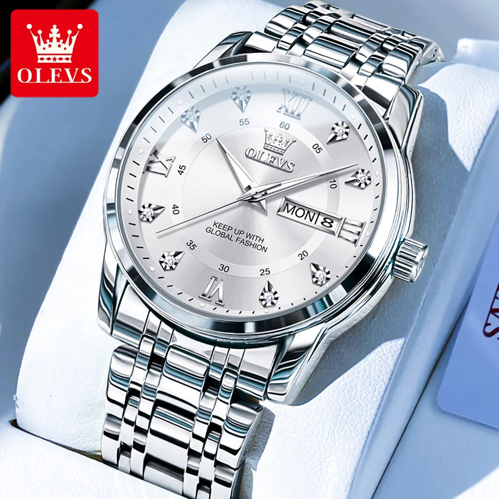 A silver stainless steel watch with a white dial and silver hands is displayed on a white background.