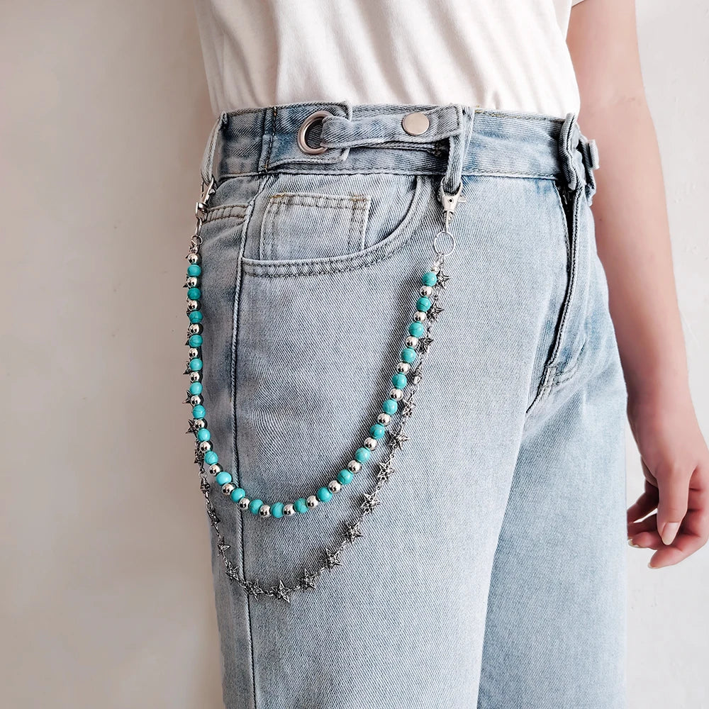 Light wash denim jeans with a silver double-layer waist chain accessory