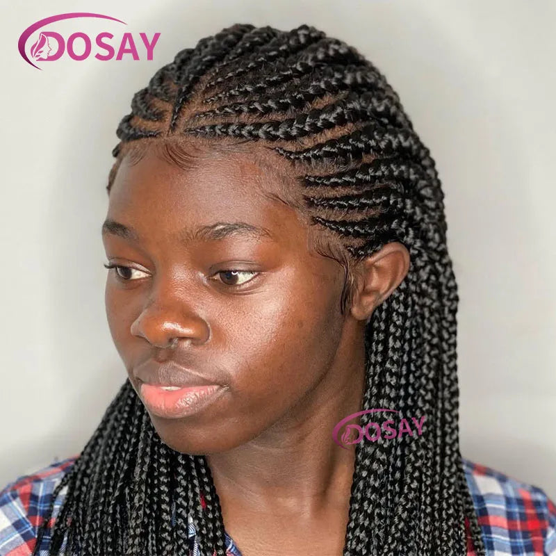 A woman modeling a long black braided wig with a full lace front