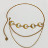 Goldfarbener Boho-Mond-Faszien-Taillenschmuck mit mehreren Strängen und Dekorationen.
