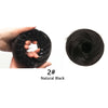 A spool of natural black synthetic hair is shown being held by a hand, with a coiled hank visible on the right.