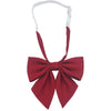 A solid red bow tie with a white neck strap for dress or uniform
