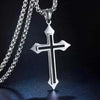 Silver pendant of a retro Christian cross amulet necklace hanging from a silver chain.