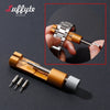 A close-up of a gold-toned watchband repair tool kit with a clamp and needle, shown next to a disassembled watch strap.