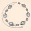 Cadena de cintura ovalada de metal dorado vintage para mujer con múltiples eslabones ovalados.