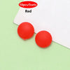 Two red silicone eyeglass grips on a white background.