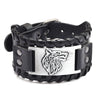 A black leather bracelet featuring a silver carved horse head design and a woven texture.