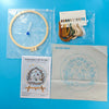 Embroidery DIY Art Kit featuring a wooden frame and various colored threads for holiday gifts