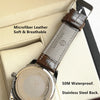 Montre quartz argentée avec bracelet en cuir microfibre marron, présentée dans une boîte claire.