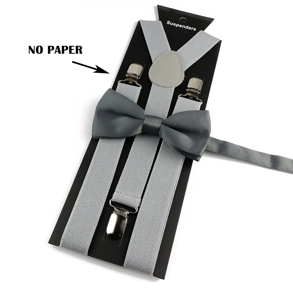 A set of black and gray adjustable polyester suspenders with a bow tie, shown against a white background.