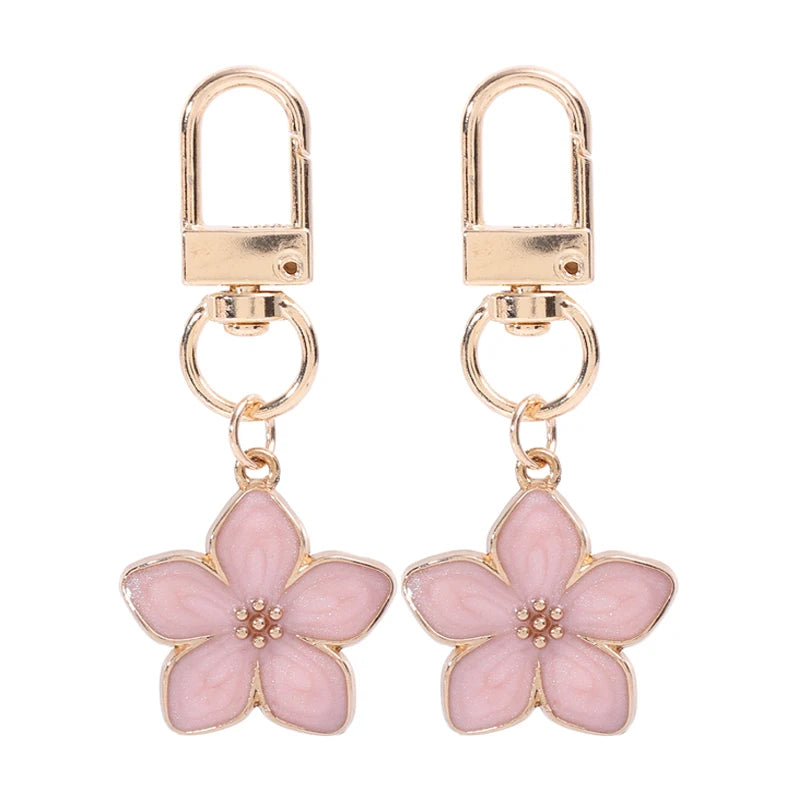 Llavero floral dorado con dije en forma de corazón para llaves y bolsos