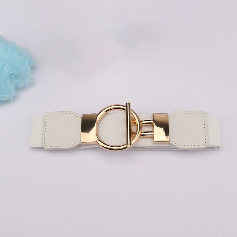 A beige leather belt with a gold round buckle and white stitching, shown against a light background.