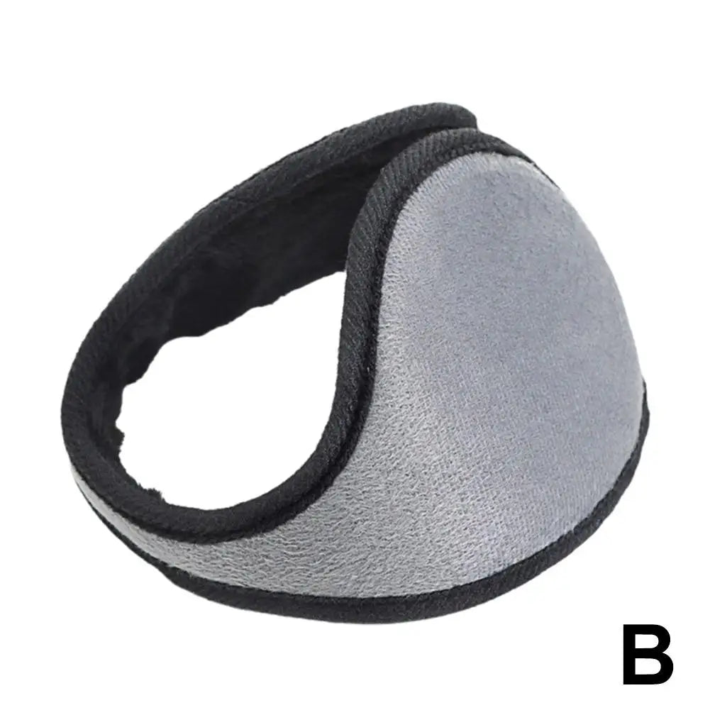 A gray plush winter earmuff is shown in a profile view.