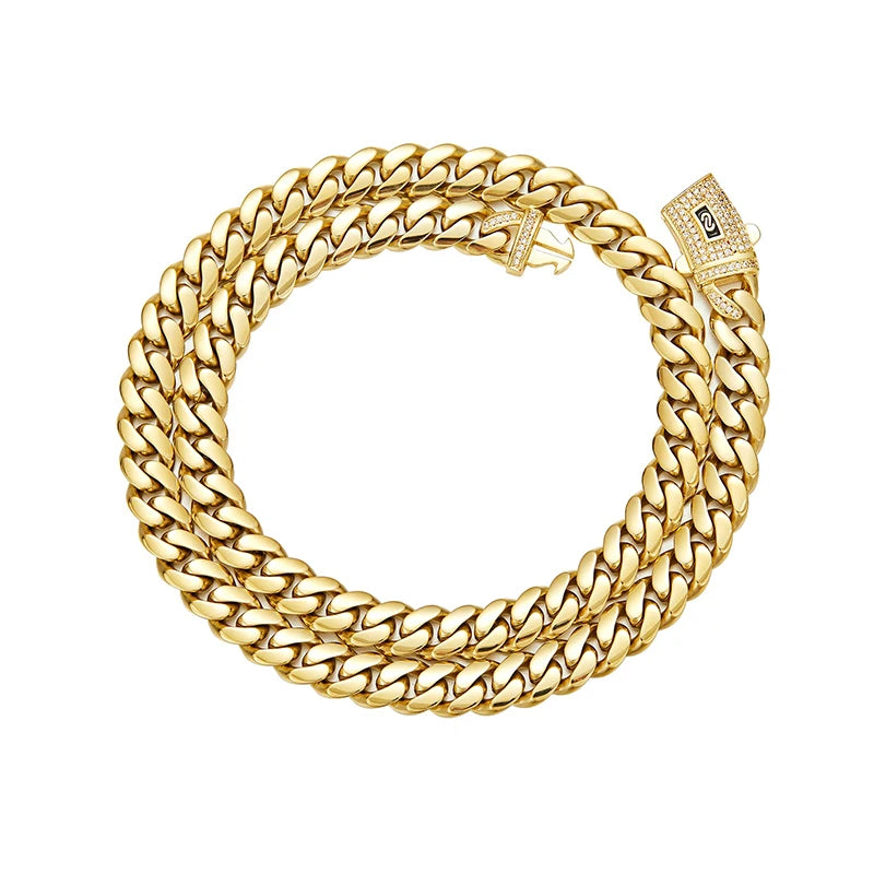 A thick gold Cuban link chain necklace with a diamond-encrusted clasp.