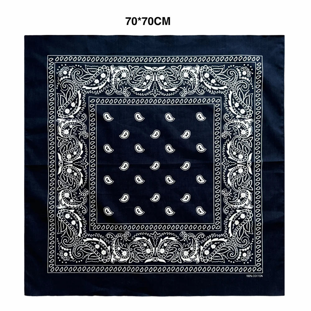 Dark blue bandana scarf with white paisley print and decorative borders