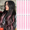 Long dark hair extensions with pink highlights and balayage, shown in a side profile.