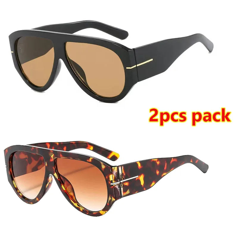 A pair of black retro oval sunglasses with gold accents and a pair of brown leopard print sunglasses are shown.